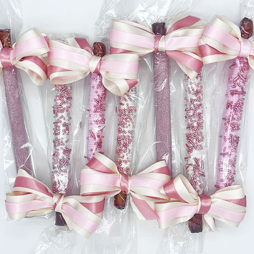 Pink and Rose Gold decorated pretzel sticks